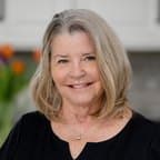 Laura B Byther