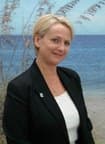 JULIE J. MILLER, Agent