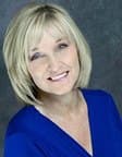 Vicki Courrier, Broker
