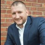 Brian M Elble
